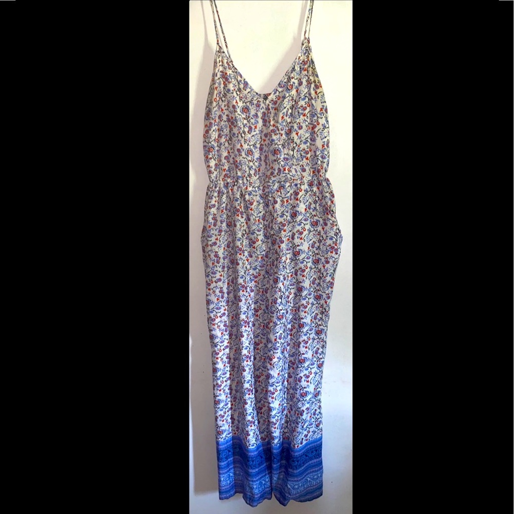 Kristin Nicole Adorable Form-Fitting Floral Jumpsuit.